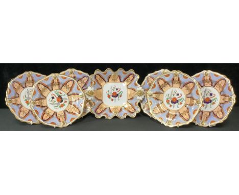 An early 20th century Hammersley &amp; Co. dessert service for six, decorated and gilded in the Imari palette, moulded with f