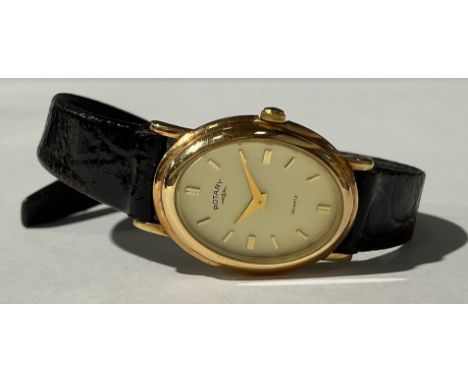 A lady's Rotary 9ct gold watch, oval dial, baton indicators, marked 375, black leather strap, boxed 