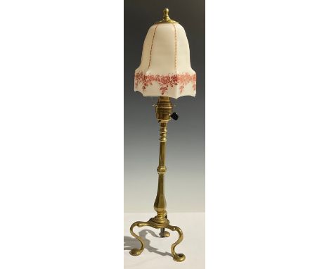 An early 20th century brass table lamp, with a glass shade, 52cm 