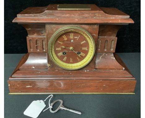 A French architectural rouge marble mantel clock, gilded Roman numerals, twin winding holes, 33cm wide, 21cm high, late 19th 