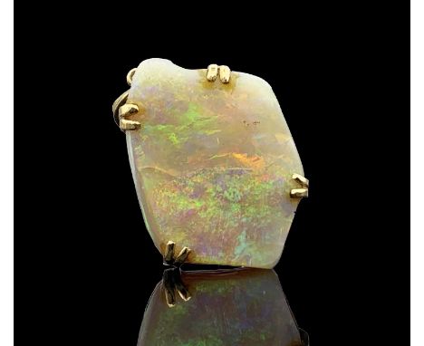 An opal pendant mounted in 18ct gold by Michael Manzi 42mm 13gm