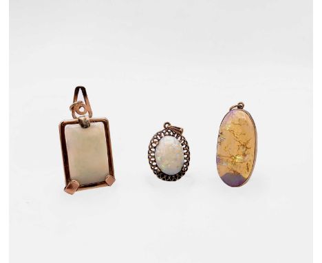 Three gold-mounted opal pendants 15.6gm