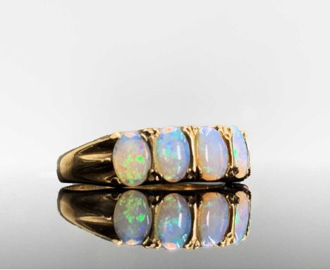 A 9ct gold five stone Victorian style opal ring 4.1gmCondition report: Settings and stones secure, very tiny chip to under ed