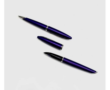 A Waterman Careine mat purple fountain pen with 18ct gold nib and a matching ballpoint pen