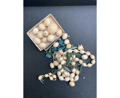 Two ivory necklaces, a jade necklace and a matrix turquoise necklace