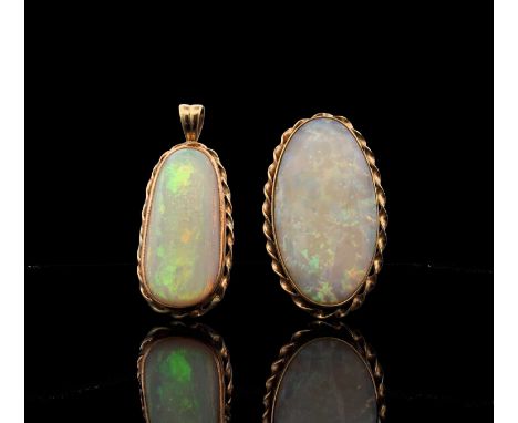 Two gold rope-twist mounted opal pendants 12.6gm
