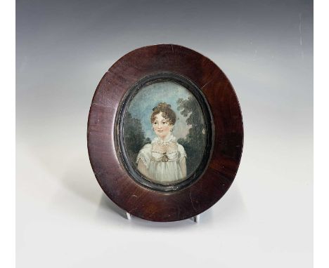 A Regency provincial minitaure portrait of a young ladyCondition report: Framed size: 19x16.8cm, portrait: 11.5x9.3cm, it is 