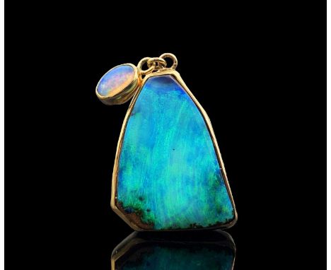 A double opal pendant mounted in 9ct gold by Michael Manzi 45mm 11.1gmCondition report: The principal stone is a Lightning Ri