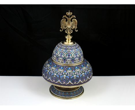 A spectacular Russian 84 Zolotnik Silver bowl and cover marked A Kuzmichev in Cyrillic, and stamped 1880. Of flattened circul