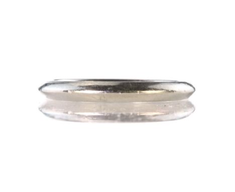 A contemporary platinum wedding band / ring apparently unmarked, plain with a bevelled edge. Ring size K / 5.25. Gross weight