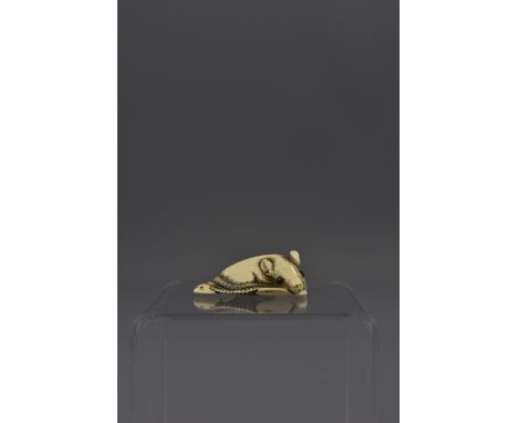 A Japanese 19th century Meiji period ivory netsuke of a large rat and inlaid eyes