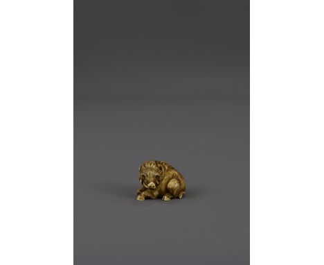 A Japanese 19th century Meiji period ivory netsuke of a wild boar. 