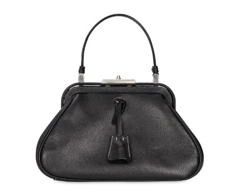 PRADA VINTAGE FRAMED TOP HANDLE BAGCondition grade A-.25cm long, 16cm high. 10cm top handle drop. Black textured leather with