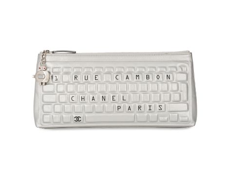 CHANEL SILVER KEYBOARD CLUTCH BAGCondition grade B+.Produced between 2016 and 2017. 30cm long, 15cm high. Silver leather with