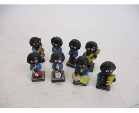 Vintage Robertson's golly band figures. These items are listed on the basis they are illustrative of by a gone culture in whi