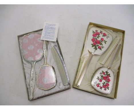 Boxed pair of vintage dressing table sets 