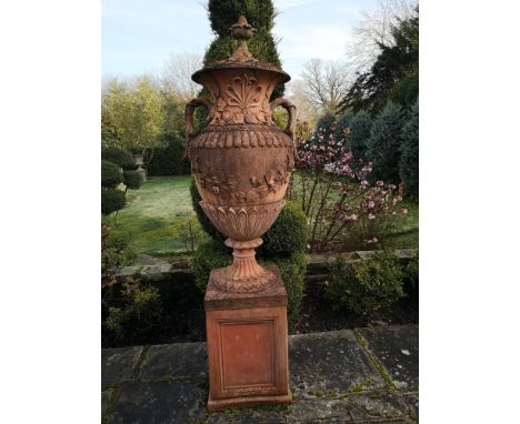 Finials: A Swedish style composition stone finial on pedestal, 2nd half 20th century, 218cm high Provenance: From a private g