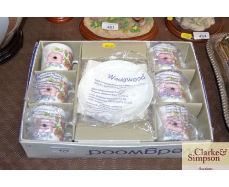 A boxed Wedgwood set of six "Meadowsweet" coffee cans and saucers 
