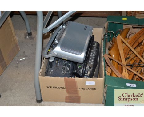 A Sony radio cassette player; a hand cassette recorder and two Roberts radios 
