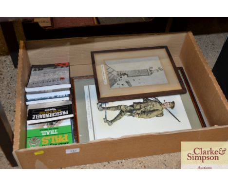 A box of military related books; a framed print "It's a Long Long Way to Tipperary" and a Bruce Bairnsfather print "They've E