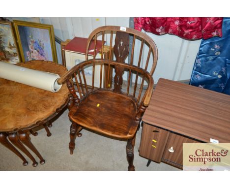 An elm seated stick back elbow chair 