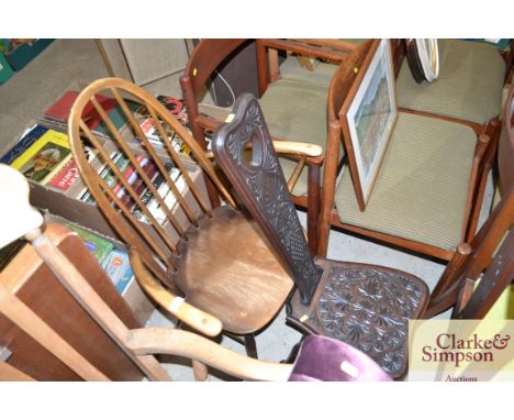 An Ercol type stick back elbow chair; and a spinning chair 