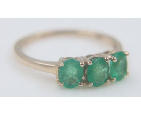 10ct gold ring set with three emeralds, size R, 1.6g. UK P&amp;P Group 0 (£6+VAT for the first lot and £1+VAT for subsequent 
