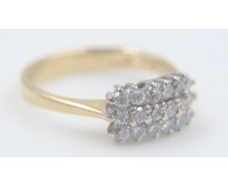 18ct gold ring, set with eighteen diamonds, size K, 3.1g. UK P&amp;P Group 0 (£6+VAT for the first lot and £1+VAT for subsequ