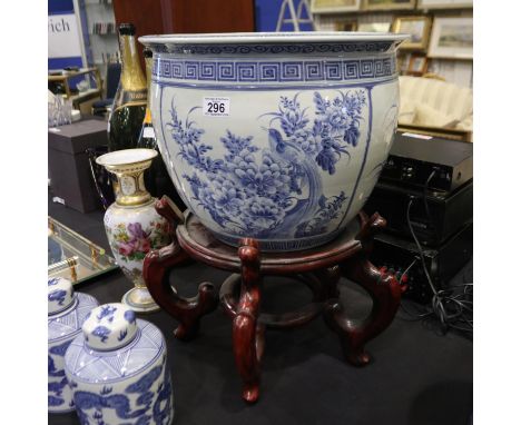 Very large Chinese blue and white planter on a 5 branch carved hardwood support, overall height 59cm. Not available for in-ho