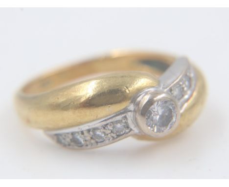 18ct gold ring, set with a central diamond and diamond shoulders, marks indistinct, size J/K, 4.9g. UK P&amp;P Group 0 (£6+VA