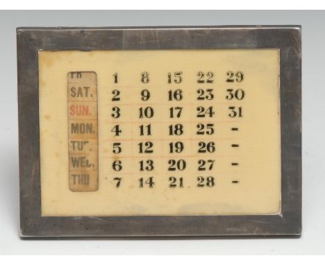 A George V silver rectangular easel desk calendar, 15cm wide, Birmingham 1921 