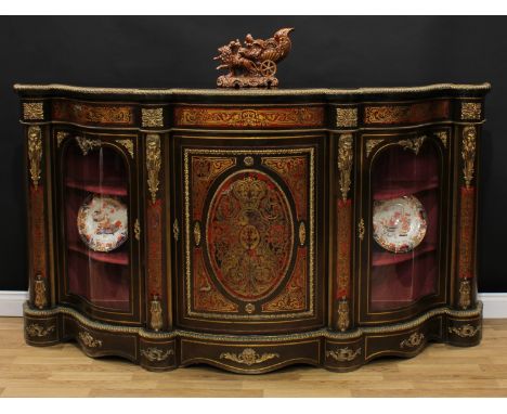 A substantial Victorian gilt metal mounted ebonised and 'Boulle' marquetry credenza, shaped top with egg-and-dart edge above 