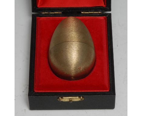 Stuart Devlin (1931 - 2018) - an Elizabeth II silver-gilt and silver surprise egg, Little Jack Horner, after the nursery rhym