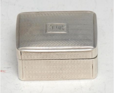 A William IV silver rounded rectangular nutmeg grater, engine turned overall, hinged cover enclosing a steel rasp, 4.25cm wid