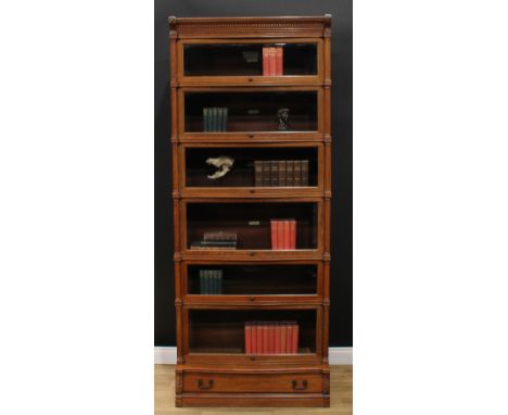 An early 20th century oak modular stacking barrister or solicitor library bookcase, by The Globe Wernicke Co Ltd, badged, mou