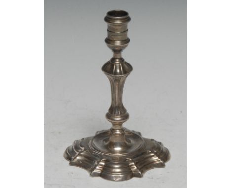 A George II cast silver taper stick, knopped pillar, shaped square base, 11cm high, London 1747, 3.75oz 