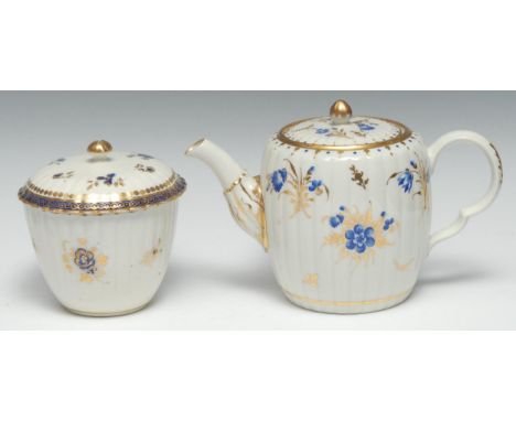 A Caughley fluted barrel shaped teapot and cover, painted with dry blue flowers, 12.5cm high, c.1790;  a similar sucrier and 