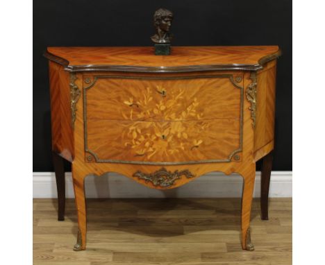 A Louis XV style gilt metal mounted kingwood and marquetry serpentine low commode, crossbanded quarter-veneered top above a p
