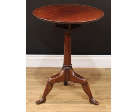 A 19th century mahogany tripod Manx table, dished circular top tilting and turning on a birdcage support, turned pillar, the 