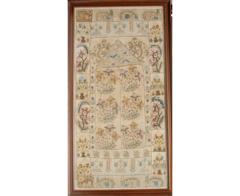 An Islamic mihrab panel, worked on linen in coloured and gilt threads with prayer niche, stylised flowers and architectural m