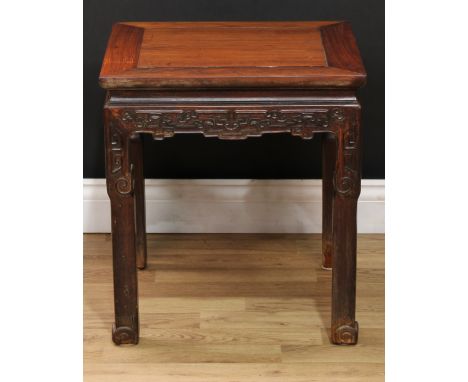 A Chinese hardwood fishbowl stand, panel top, shaped frieze carved with angular scrolls, square-section legs, scroll feet, 53
