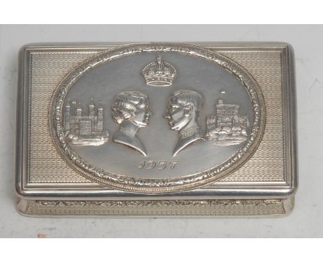 A George VI silver rounded rectangular castle top snuff box, commemorative of the 1937 Coronation, hinged cover with profile 