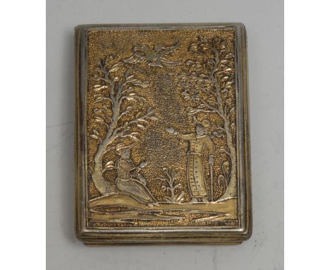 An 18th century silver-gilt rectangular snuff or spice box, hinged cover enclosing an inner compartment, chased with figures 