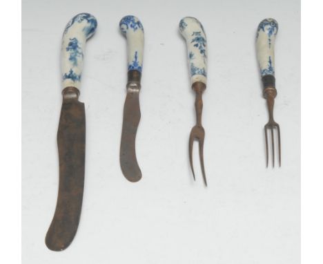 A Bow knife and two pronged fork, the pistol grip hafts painted in underglaze blue with  foliate tendrils and scrolls, the kn