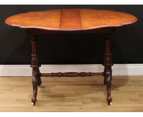 A Victorian burr walnut shaped oval Sutherland table, quarter-veneered top with fall leaves, drawers to frieze, turned end su
