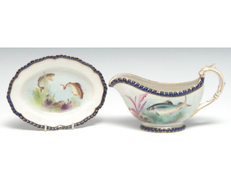 A Royal Worcester Vitreous ichthyological sauceboat and stand, painted with swimming trout, gadrooned cobalt blue borders pic