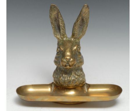 A 19th century gilt bronze novelty inkwell, cast as the head of a hare, hinged cover enclosing a blue glass liner, dished pen