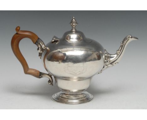 A George/William IV Rococo Revival silver inverted pear shaped teapot, hinged domed cover with pine cone finial, acanthus-cap