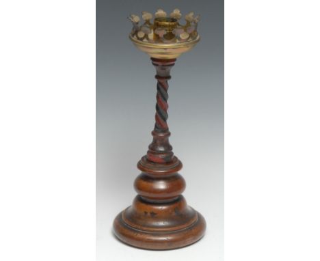 A 19th century walnut, wrought iron and brass candlestick, cylindrical scronce and broad drip pan with Gothic border, spiral 