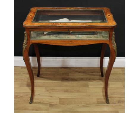 A Louis XV Revival gilt metal mounted rosewood and marquetry bijouterie table, hinged serpentine top with inset bevelled glas